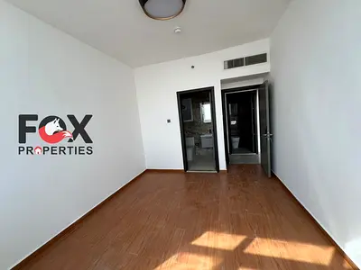 Brand new one bedroom and living room apartment for annual rent in Al Nuaimiya 3, first tenant in a modern tower with a prime location near Dubai Isla