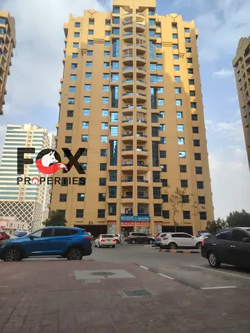 Two-bedroom apartment with a living room for annual rent in Al Rashidiya 1, Al Khor Towers. Spaciou