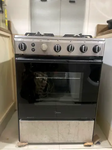 Midea 4-Burner Gas Cooker with Oven - Good Working Condition