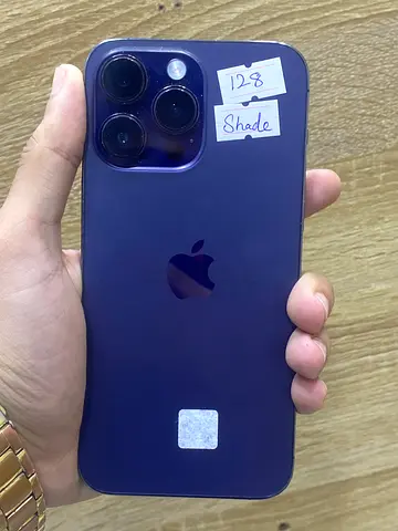Purple iPhone (looks like iPhone 14 Pro) — Good working condition