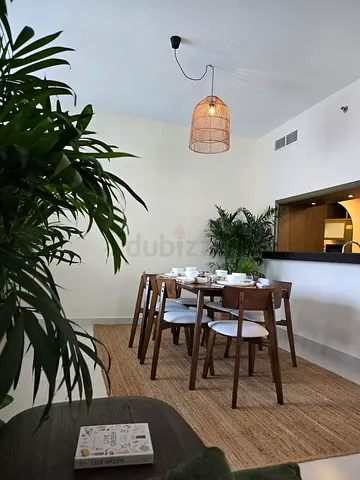 MOVING SALE: Natural Jute Dining Area Rug