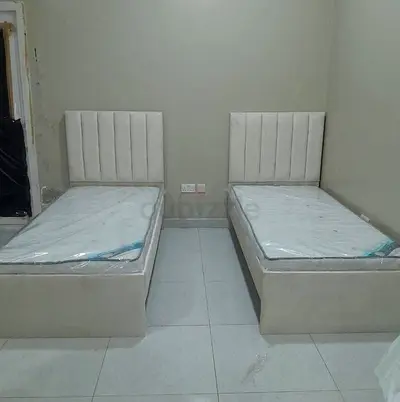 Brand New Pair of Single Beds with Mattresses - Light Beige Upholstered Frames