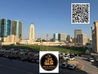 عرض مميز: شقة غرفتين نوم بإطلالة رائعة على الاستاد للإيجار بسعر لا يُضاهى، مساحة واسعة وسعر مميز في موقع استراتيجي بأبراج الراشدية.