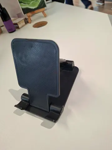 Foldable adjustable phone/tablet stand - compact and portable