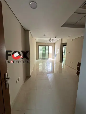 Two bedrooms and a living room for annual rent in Ajman, in Emirates City. First resident. New building. Balcony. 2 bathrooms. Spacious areas.