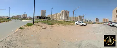 corner land for sale in a prime location in Ajman, Al Yasmin district