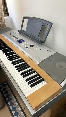 Yamaha Portable Keyboard with Stand and Built-in Speakers - Good Condition