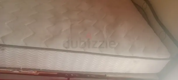 Double mattress in good condition - firm support 50cm thikness with spring matress