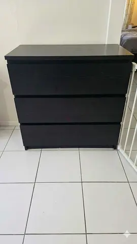 Three-drawer black dresser / chest in good condition