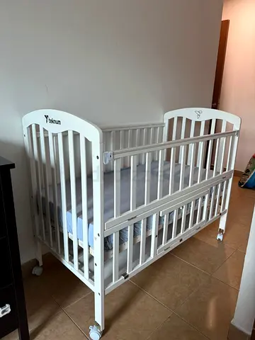 White Wooden Baby Crib with Adjustable Side, Mattress,  Wheels  Storage - Perfect Condition