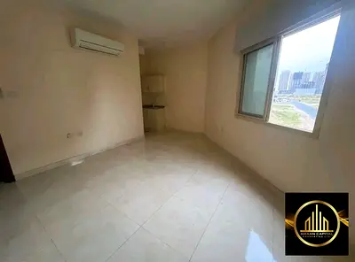 Studio apartment for annual rent in Al Alia area, newly built building, second occupant on Sheikh Mohammed Bin Zayed Road