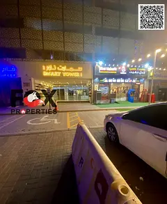 Studio apartment for annual rent in Ajman Smart Tower with gym, swimming pool and parking inside the