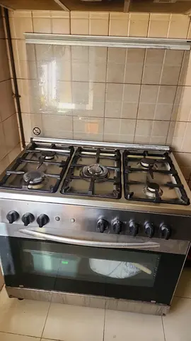 Used freestanding stainless steel gas cooker with oven (5-burner)