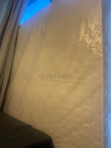 King size mattress - Brand new (with original plastic cover)