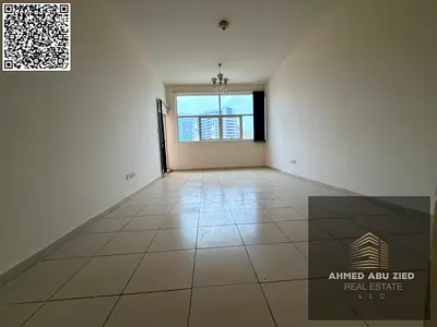 شقة غرفة وصالة للإيجار في أبراج عجمان ون الراشدية 3 بلكونة بإطلالة مفتوحة ومطبخ أمريكي و2 حمام مع باركينج مجاني وحديقة بسعر 38 ألف