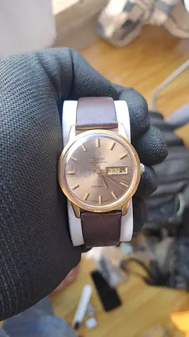 vintage Zodiac Automatic Goldenline watch from the 1970s, featuring a gold-plated . 20 micron