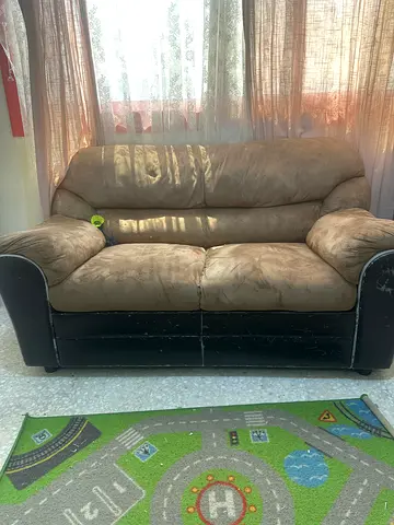 2-Seater Beige Suede Sofa with Black Wooden Frame — Good Condition