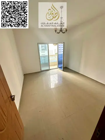 Two bedrooms, a living room, a bathroom, and a balcony. Large area in Al Nuaimiya 3.