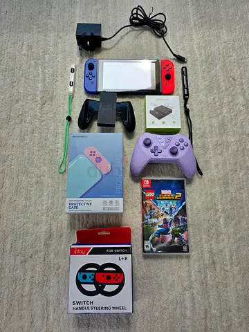 The Nintendo Switch comes with a free additional controller, a Nintendo Switch case, and a free game