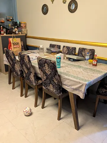 8 seater Solid Wood Dining Table (one side shown) - Good Condition