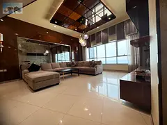 Annual rent in Ajman: super deluxe duplex on the Corniche with direct sea view, in a tower with pool