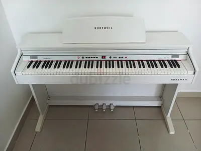 The Kurzweil KA130 is an 88-key, fully weighted hammer-action digital console piano designed