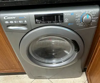 Candy front-load washing machine (used) - 7kg, silver