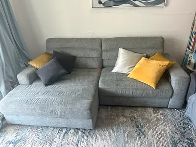 Super comfortable and modern electric recliner sofa in a stylish grey fabric. Perfect for movie nigh