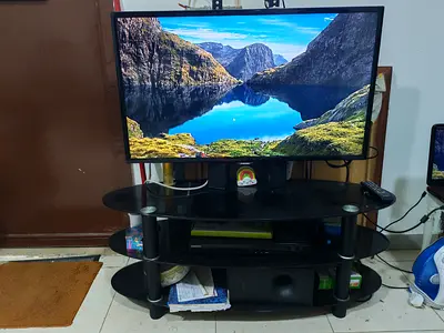 40- Samsungs non smart LED TV with glass stand - with home theater