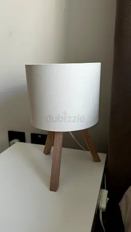 Small IKEA wooden tripod bedside table lamp with white shade
