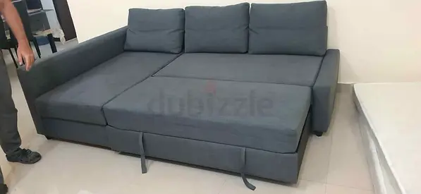 Ikea L shape sofa store cum bed and you can fix the storage lift or right