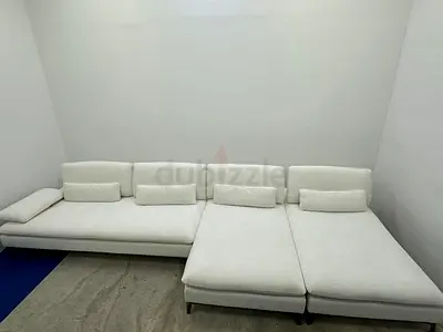 Like new condition rochebobois lshape sofa