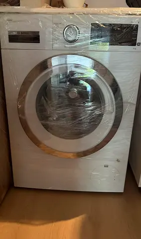Bosch I-DOS MODEL 8.. Washing Machine -9 kg  (White) excellent condition. Bought for 5000 AED.
