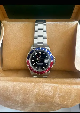 Rolex GMT-Master style stainless steel watch with Pepsi bezel