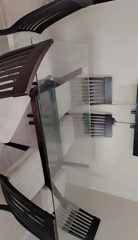 Glass Top Dining Table with 6 العنوان القصيدات ،، دوار الفانوس
