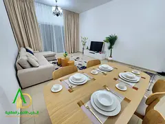 Two rooms and a hall in Al Yasmeen Towers, Ajman Al Jurf, fully furnished with luxury bedding and in