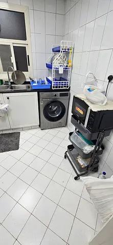 Used Front-Load Washing Machine in Working Condition - Compact Laundry Unit