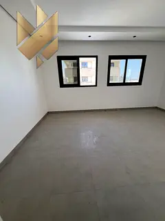 Two-bedroom apartment with a living room – spacious areas – 2 balconies – in Al Falah area –