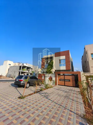 Luxury villa for sale in Al Yasmin, Ajman, including electricity, water and air conditioning