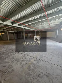 A prime warehouse in a strategic location, spanning 14,000 square feet on the main street, suitable