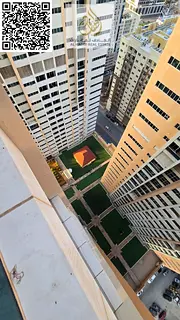Two bedrooms, a living room, three bathrooms, a balcony, very spacious areas in Ajman One Towers, wi