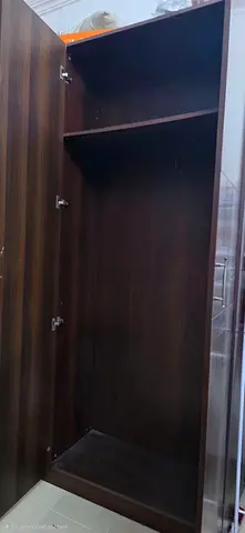 Cupboard , tea-table and mattress