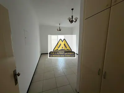 One bedroom and living room with built-in wardrobes | Equipped with a balcony | Naturally lit apartment | Easy access to Dubai and Sharjah