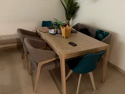 Light Wood Dining Table with 6 Upholstered Chairs - Good Condition only serious buyers call not nego