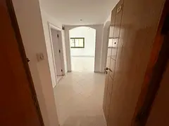 Two bedrooms and a living room for annual rent in Al Majaz 1, Sharjah | Free AC | Built-in wardrobes