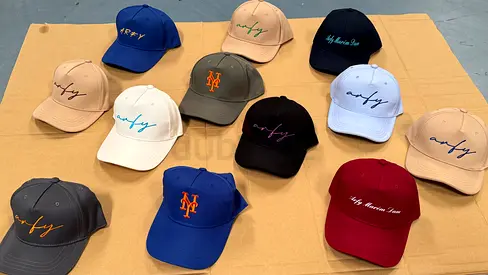 Lot of 12 assorted embroidered baseball caps — mixed colors, new/like new