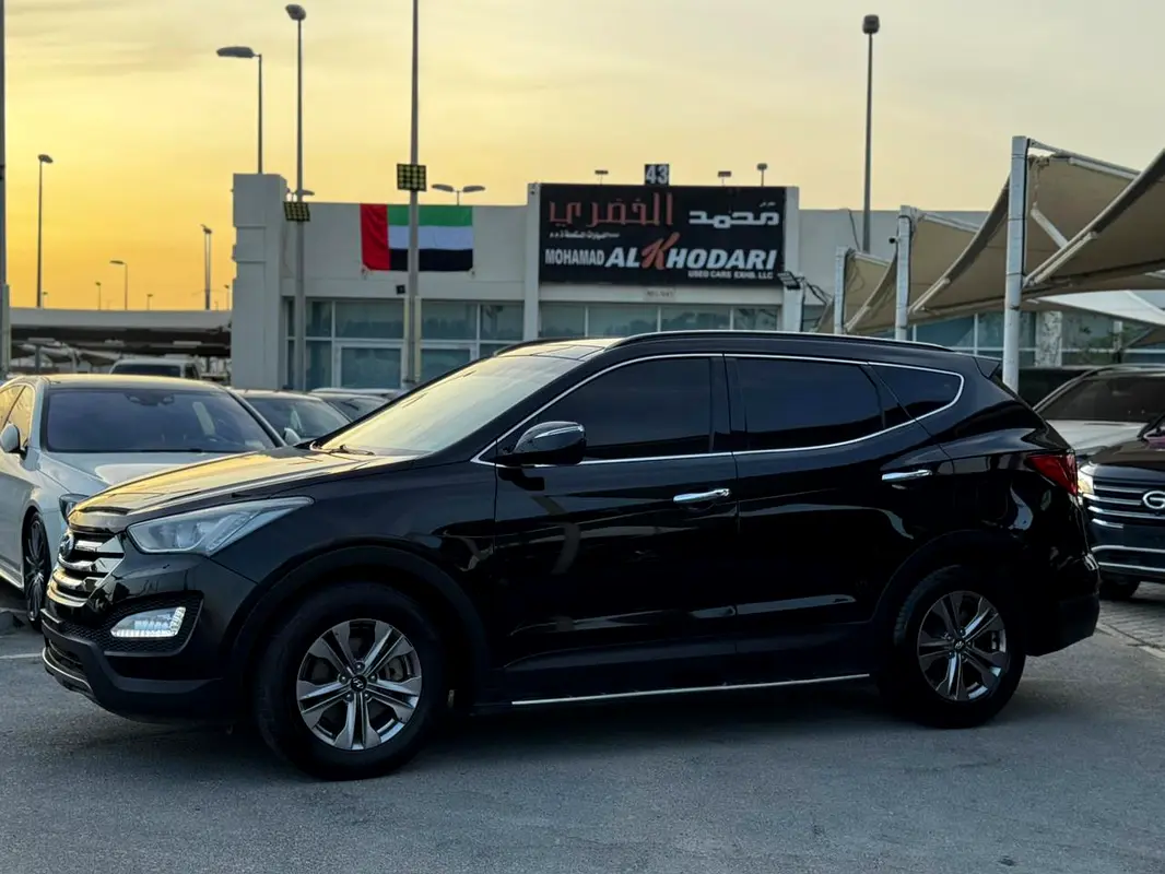 Hyundai Santa Fe 2016 — photo 1 of 14