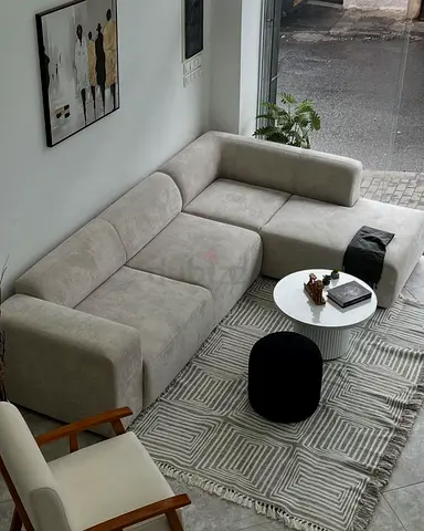 Modern L-shaped Beige Fabric Sofa — Good Condition