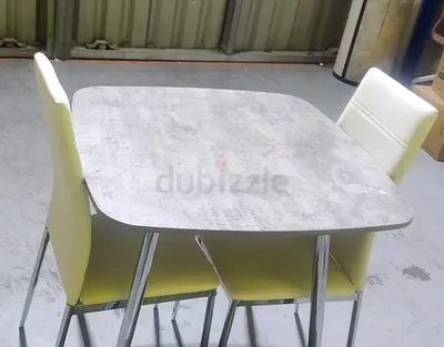 Dinning table with two chairs available in perfect condition