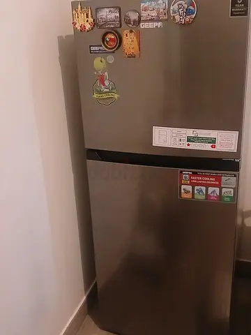 Used stainless steel double-door refrigerator - good condition like brand new